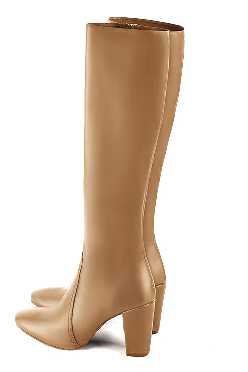 French elegance and refinement for these camel beige feminine knee-high boots, 
                available in many subtle leather and colour combinations. Record your foot and leg measurements.
We will adjust this pretty boot with zip to your measurements in height and width.
You can customise your boots with your own materials, colours and heels on the 'My Favourites' page.
To style your boots, accessories are available from the boots page. 
                Made to measure. Especially suited to thin or thick calves.
                Matching clutches for parties, ceremonies and weddings.   
                You can customize these knee-high boots to perfectly match your tastes or needs, and have a unique model.  
                Choice of leathers, colours, knots and heels. 
                Wide range of materials and shades carefully chosen.  
                Rich collection of flat, low, mid and high heels.  
                Small and large shoe sizes - Florence KOOIJMAN